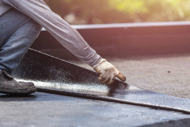 Professional Exterior Waterproofing technician working in Wheaton, MD